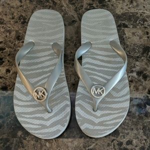 Michael Kors gray zebra flip flops